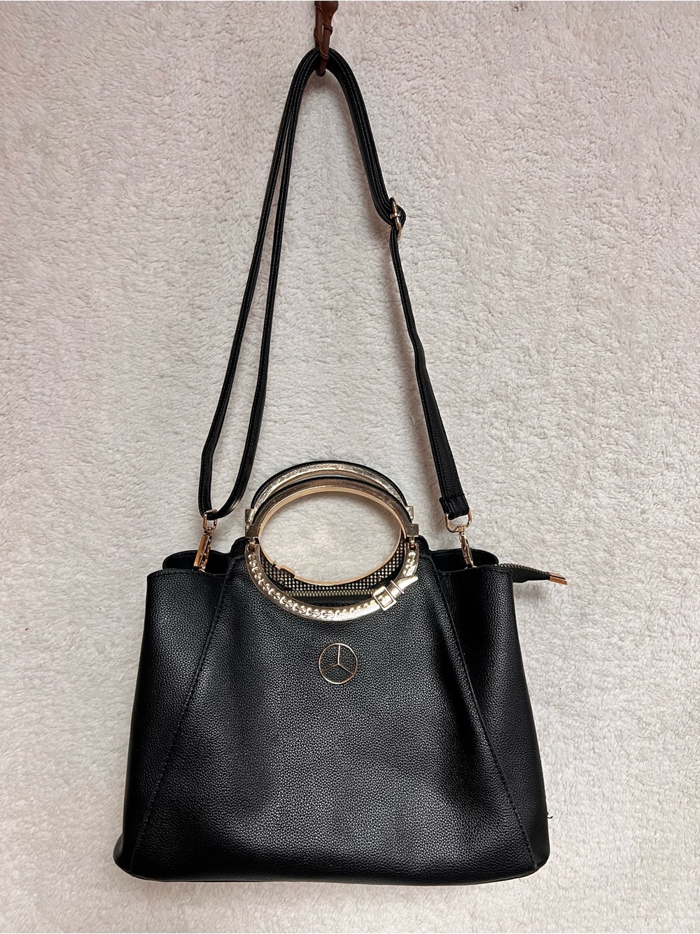 Mercedes Benz Chic Black Shoulder Bag with Gold Accent Handles